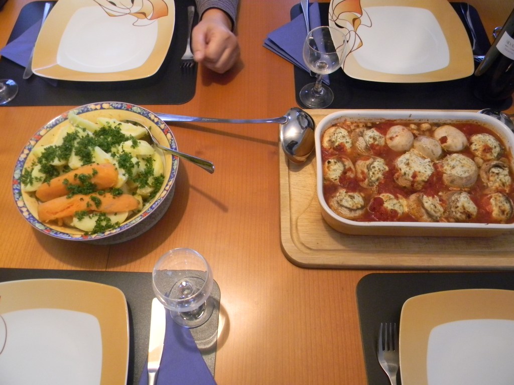 One of Astrid's sumptuous meals: Filled mushrooms and a platter of vegies.