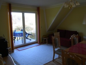 I can see the hut from here, which is the living-room of our unit with attached balcony. 