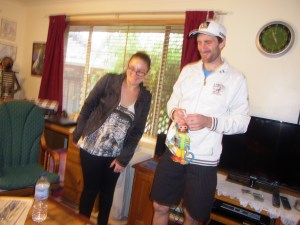 Ebony and Ryan looking at their son.