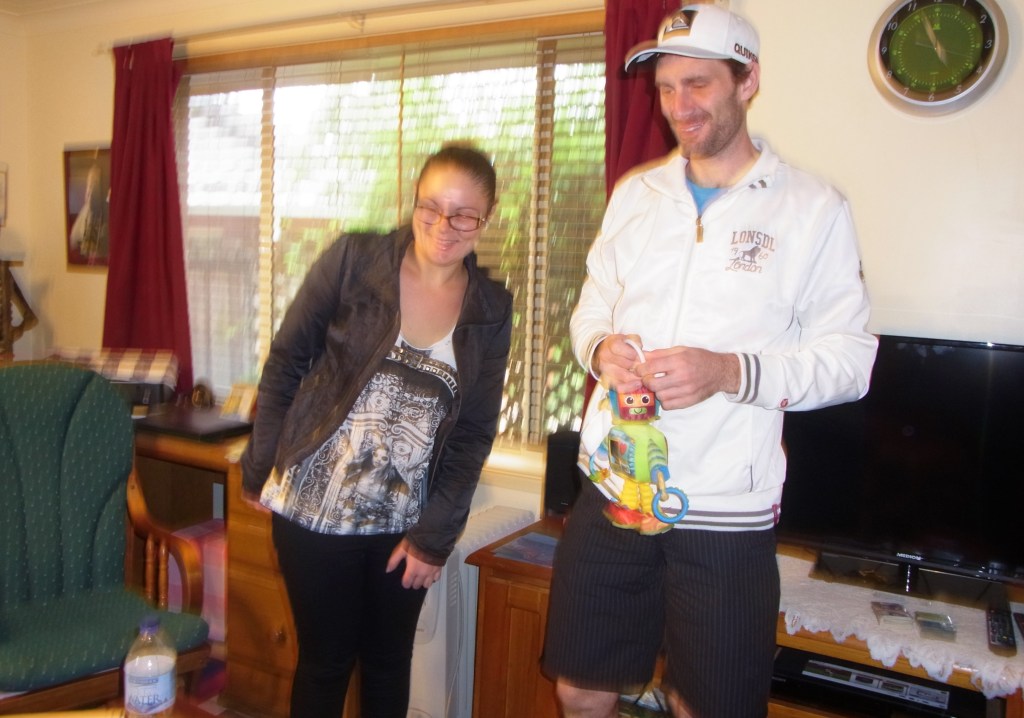 Mum and Dad are looking on.