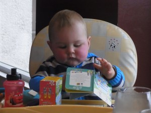 We're still waiting for Mark to arrive. In the meantime Lucas plays with his books.