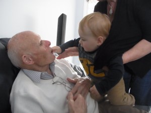 Lucas gives Peter an olive to eat