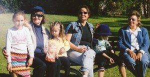 Krystal sits between Monika and me.