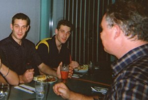 Martin sits opposite the Twins, Ryan and Troy.