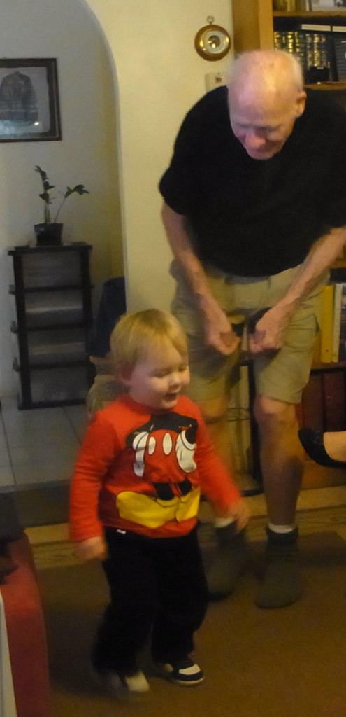 Here Peter is with dear little Lucas.