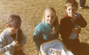 Here are Caroline and the Twins with Baby Tristan at Stuart Park, North Wollongong, on the 18th August 1985.