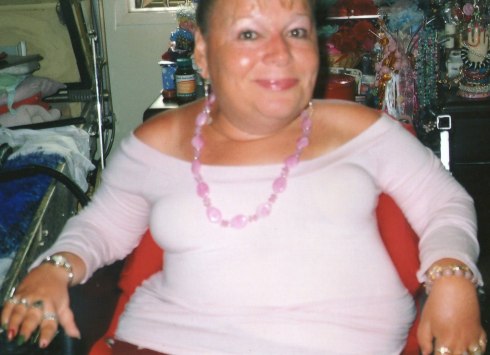 Here she is in her bedroom getting ready for the day.