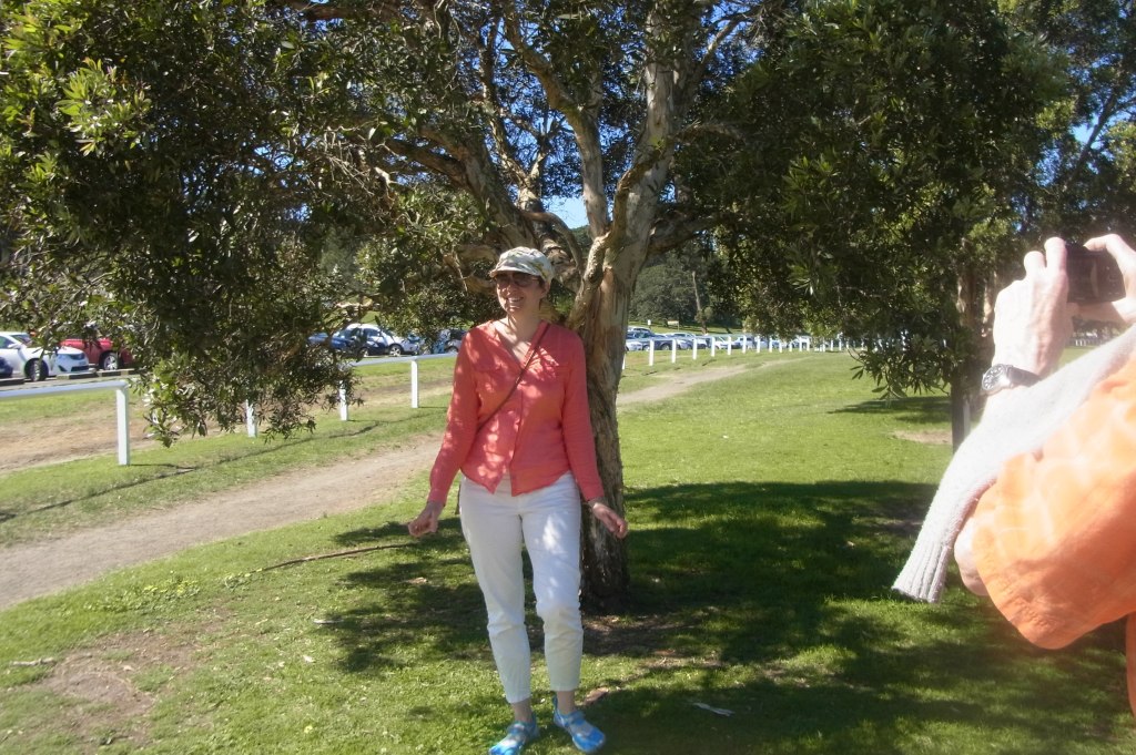 Peter takes a photo of Caroline.