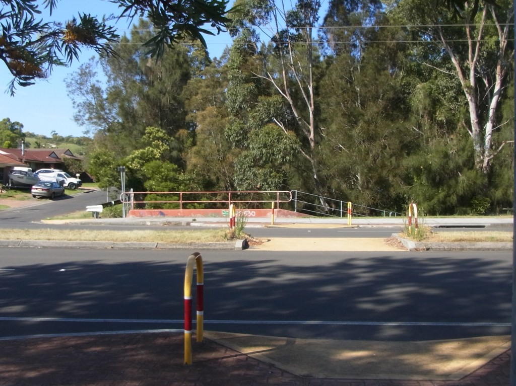 Looking back towards a pedestrian crossing at Fowlers Road.