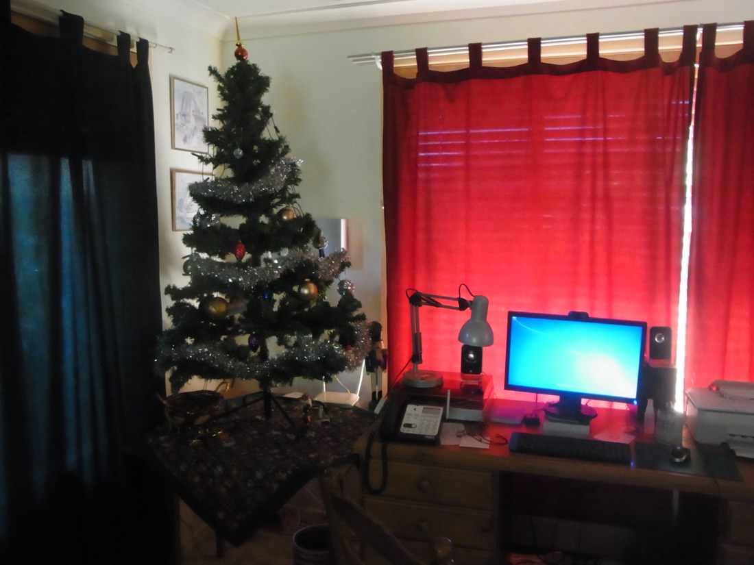 The computer screen next to the tree reminds me of Lucas on Christmas Eve.