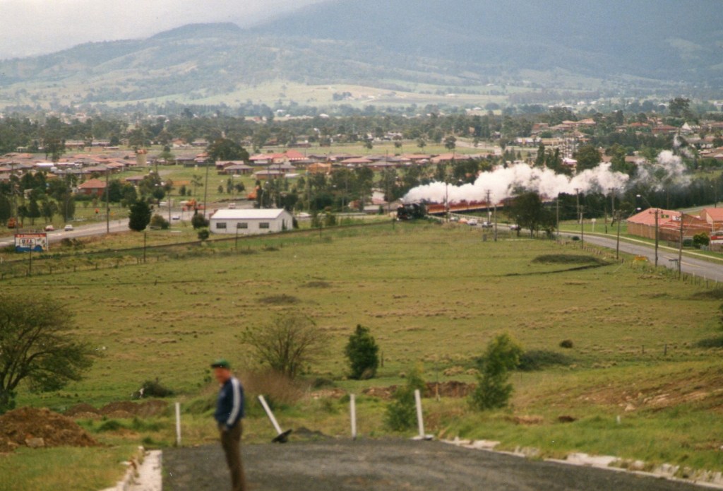 Ah, here it is: A special steam train with full steam at Oak Flats Station!