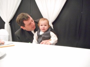 The bride's father with little Alexander.