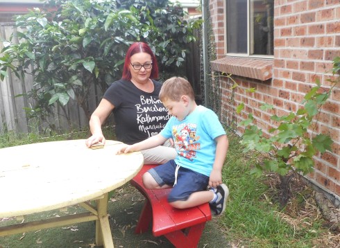Here Lucas is having a rest with his Grandma Monika after having been running around for a while.