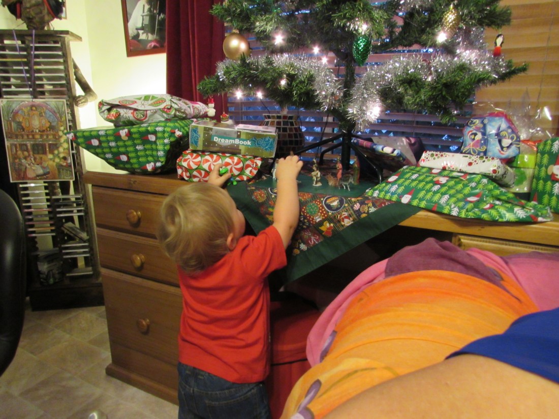 Little Lucas under the Christmas Tree